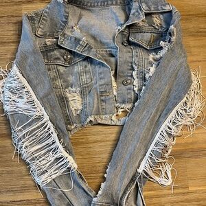 Distressed Denim Jacket with Fringe